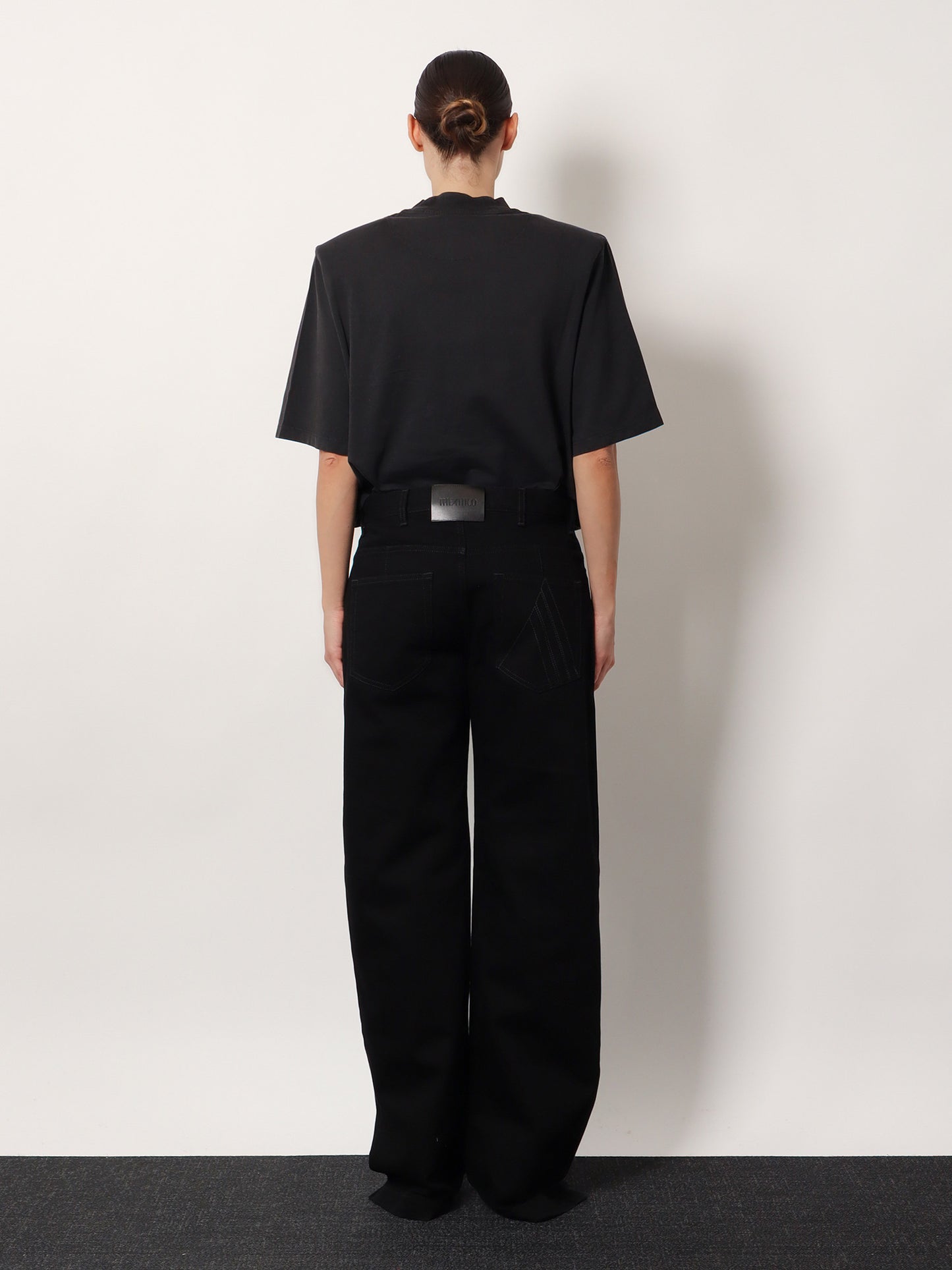 Black denim trousers