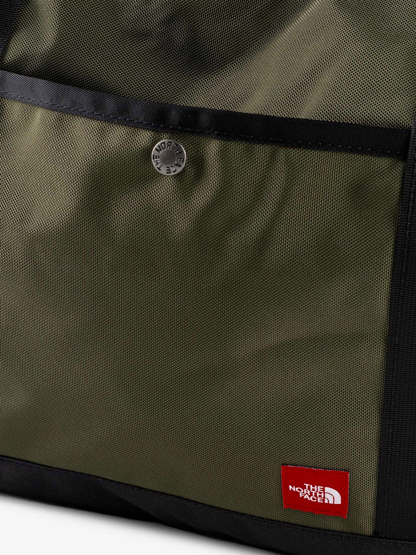 Nylon shoulder bag with logo label on the bottom