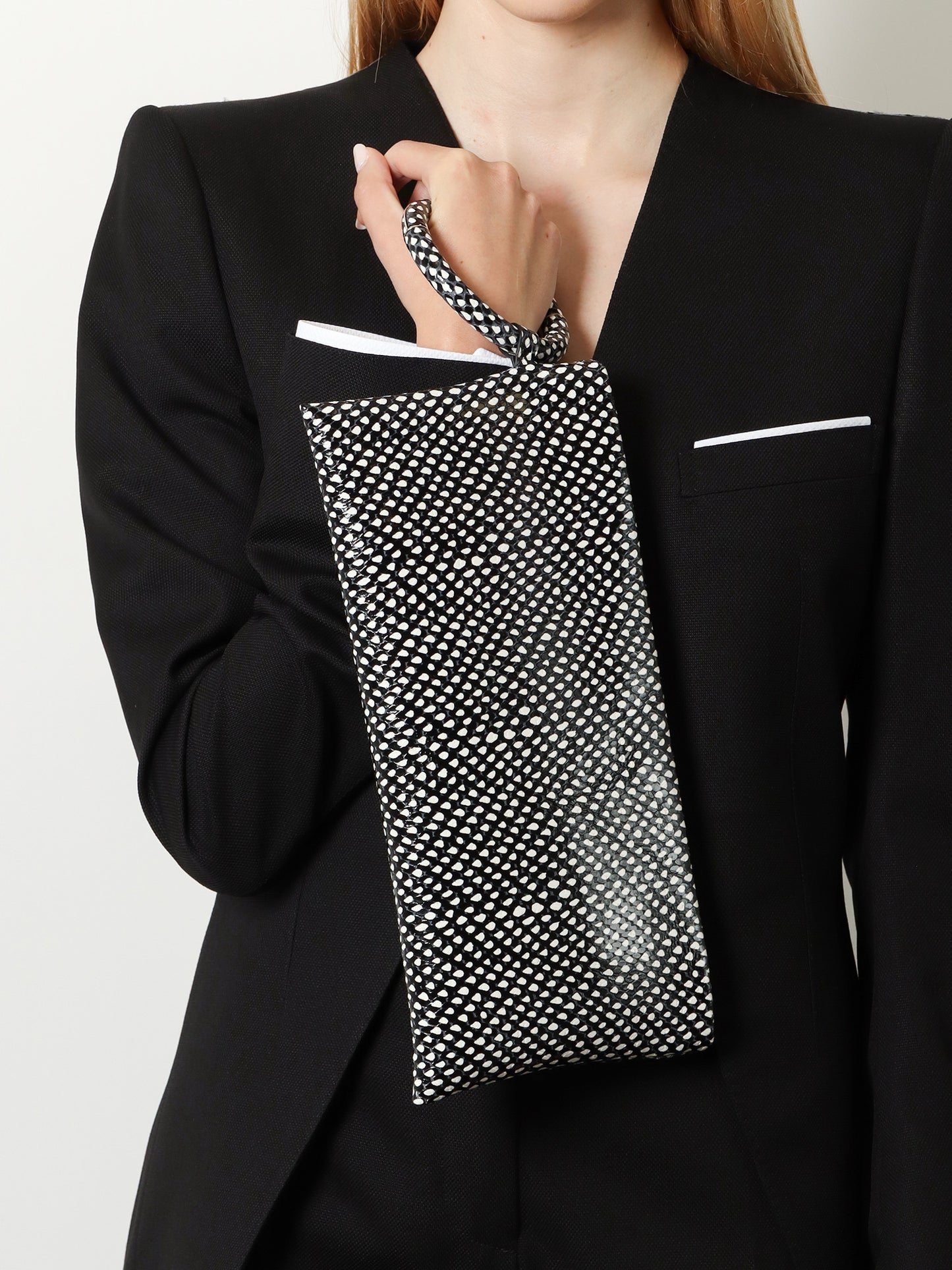 Aura leather clutch bag with snake motif