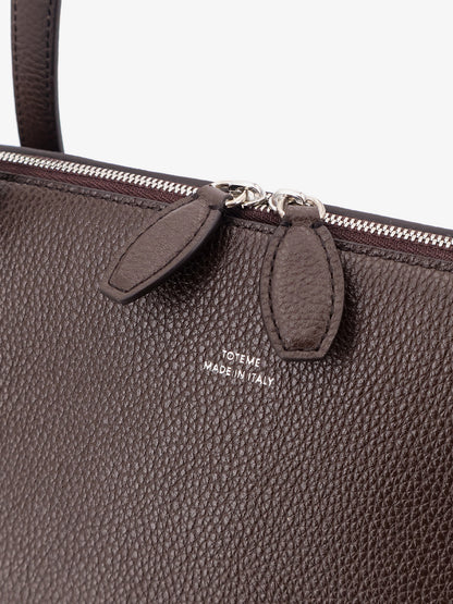 Suede handbag with engraved logo on the front thumbnail