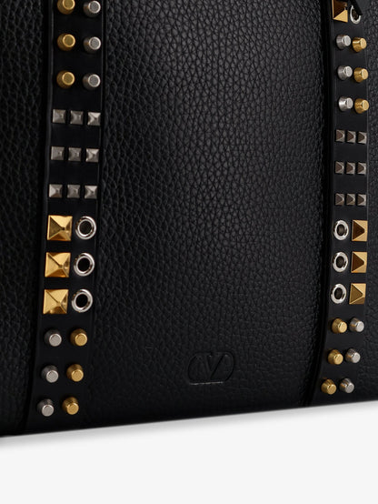 Leather shoulder bag with iconic studs thumbnail
