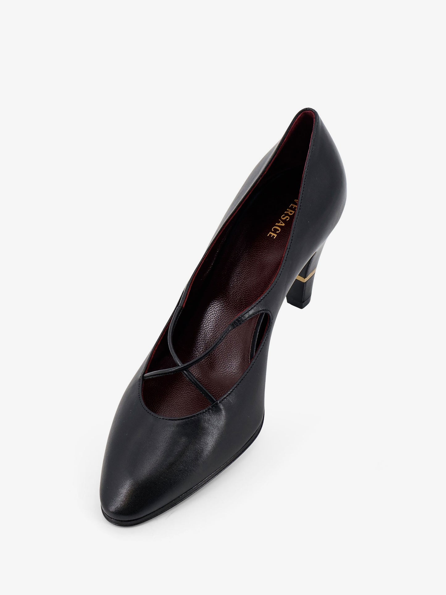 Criss-Cross Medallion leather pumps