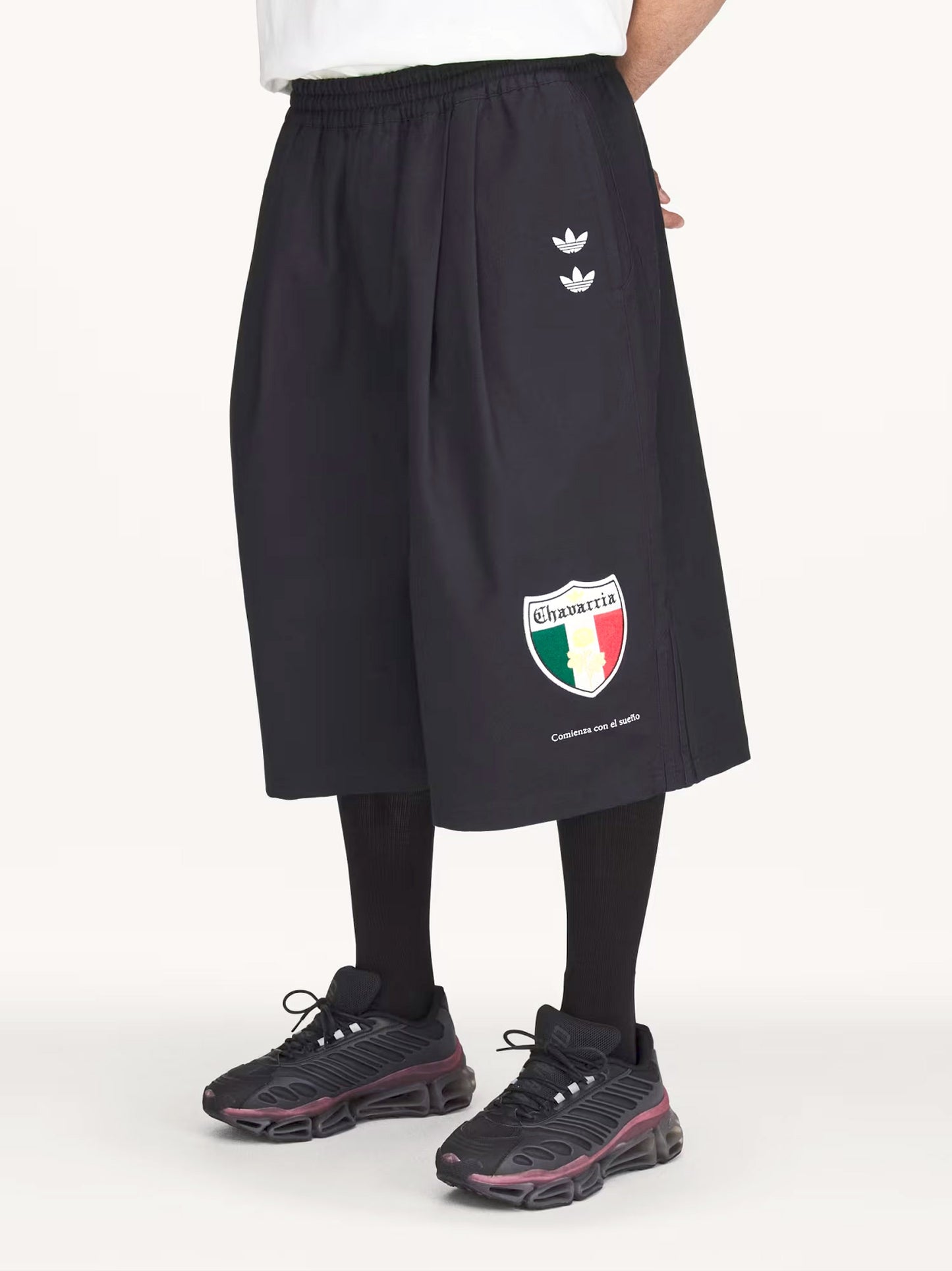 Oversized cotton Bermuda shorts with logo embroidery