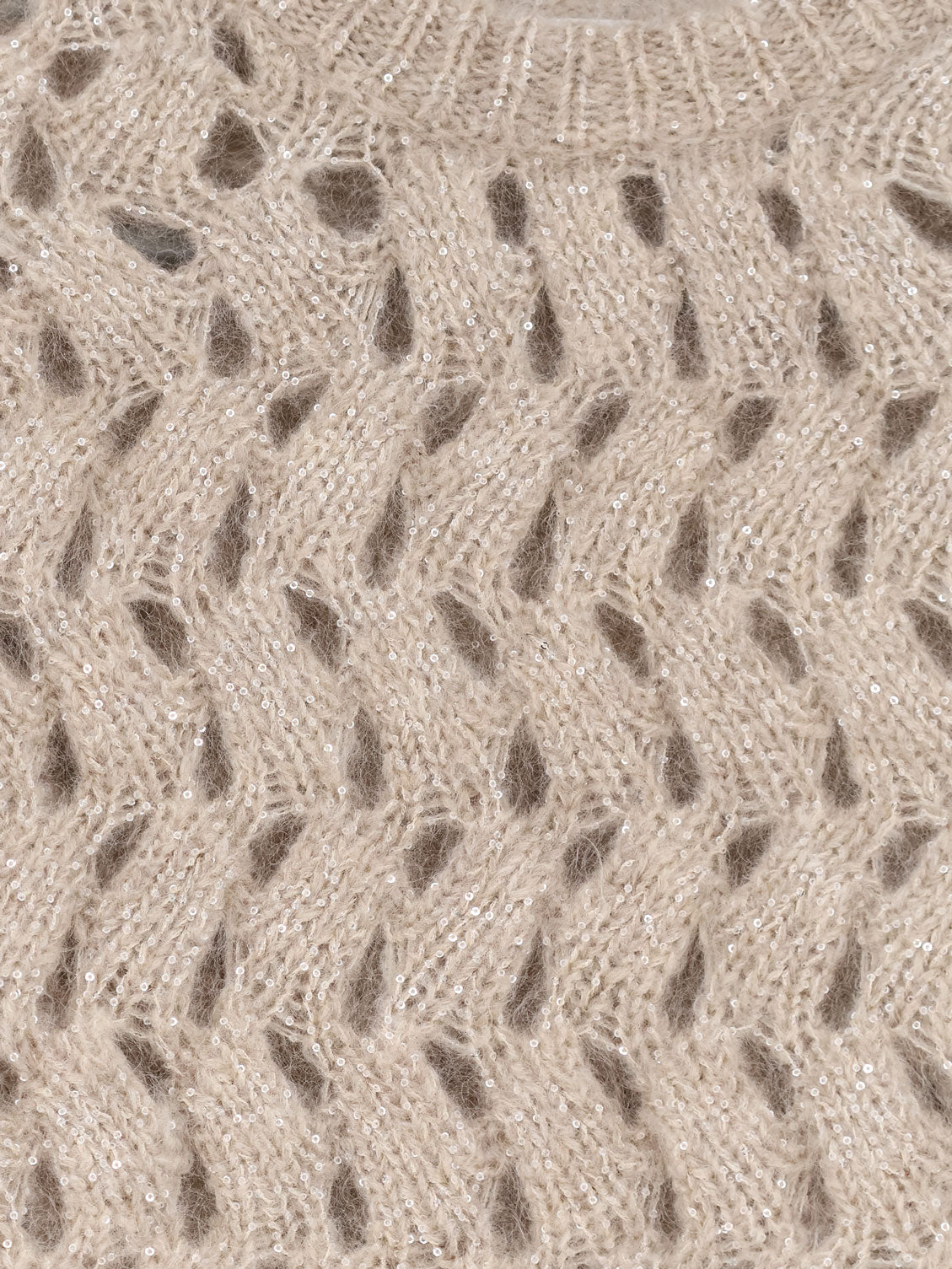 Perforated sweater with micro sequins
