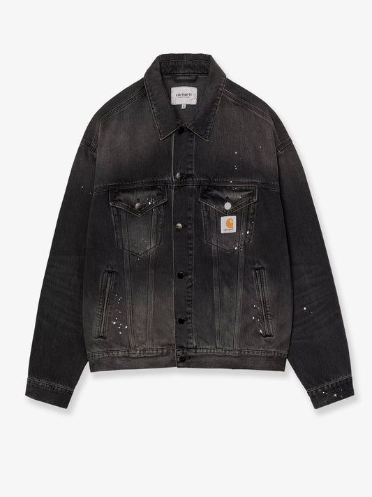 Black denim jacket with a distressed effect
