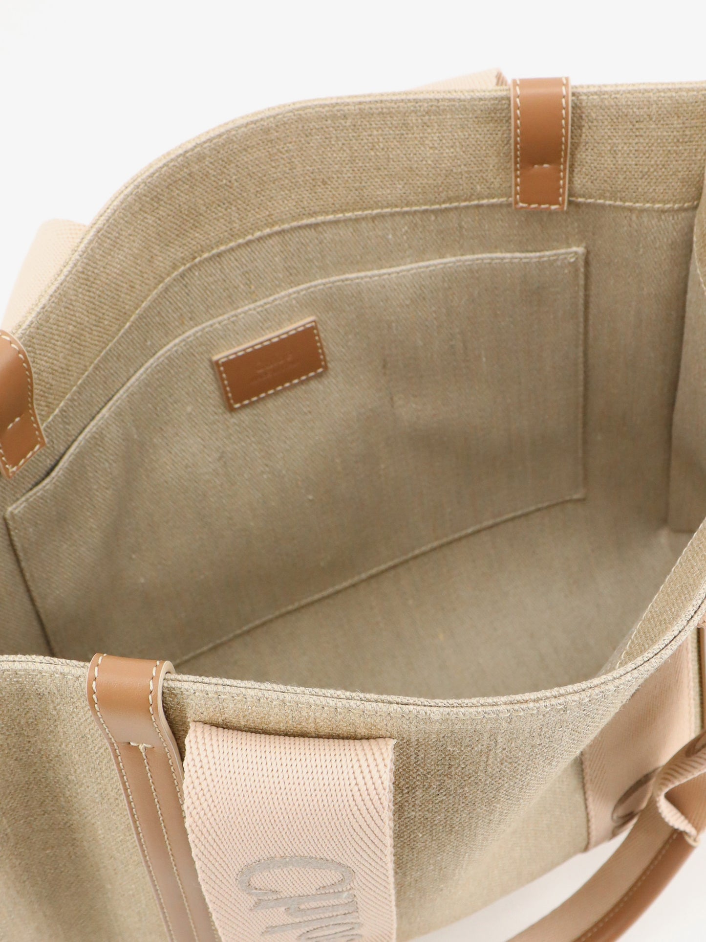 Woody linen shoulder bag with front embroidered logo