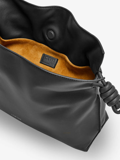 Flamenco leather clutch bag thumbnail