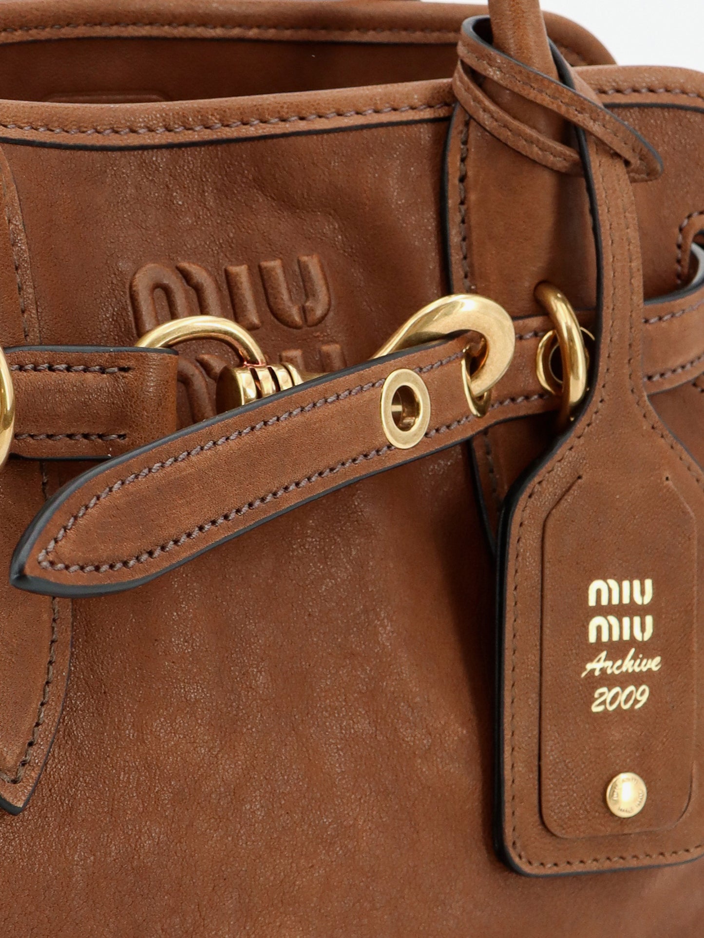 Aventure leather handbag with embossed lettering logo