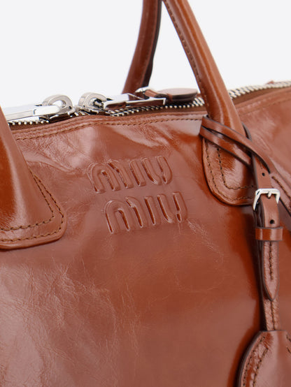 Shiny leather handbag with front lettering logo thumbnail