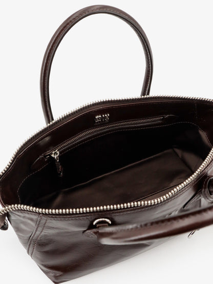 Leather handbag with embossed lettering logo thumbnail