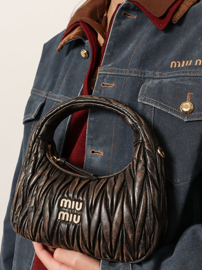 Wander quilted leather crossbody bag with a vintage effect thumbnail