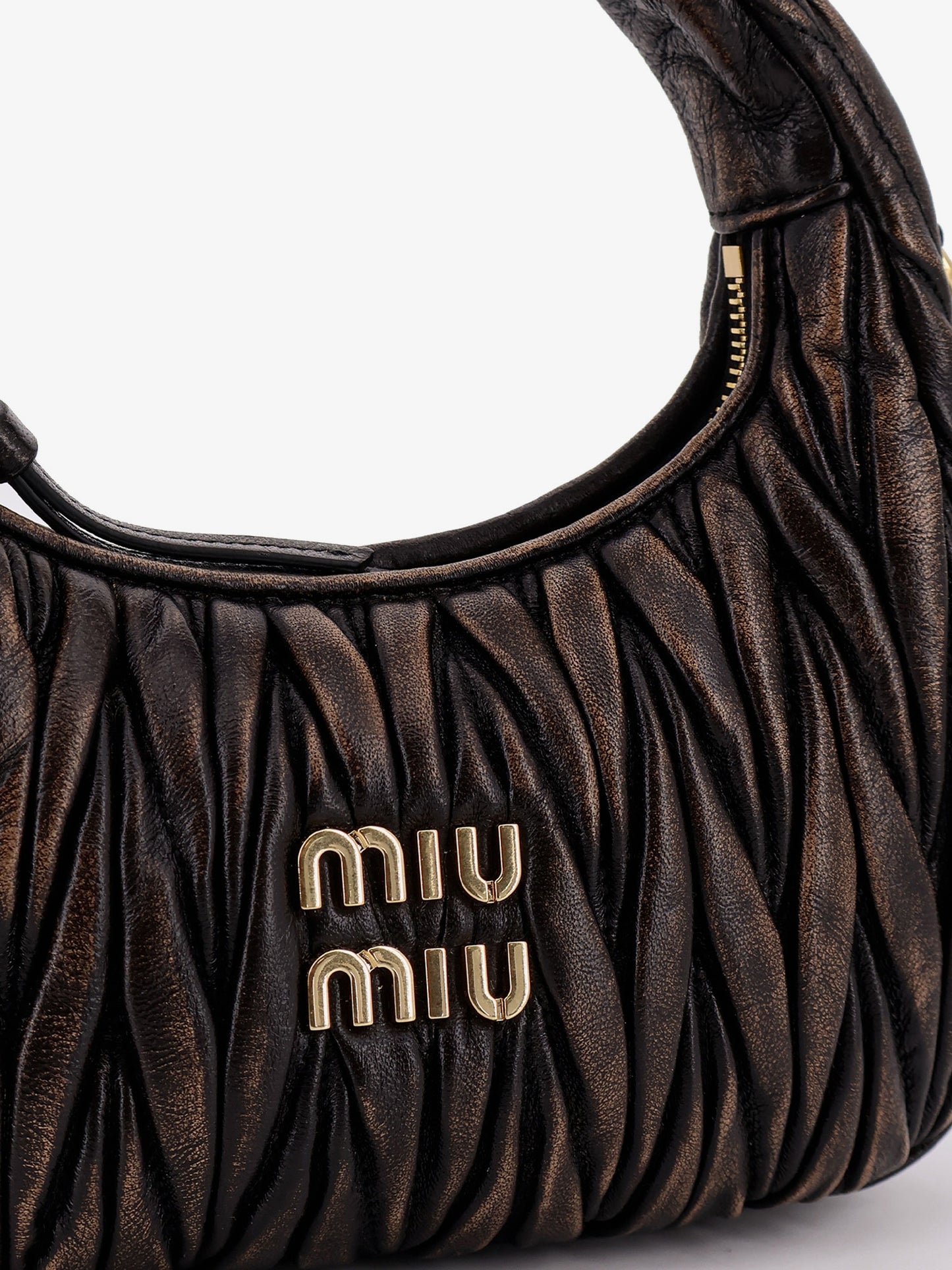 Wander quilted leather crossbody bag with a vintage effect