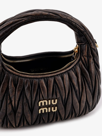 Wander quilted leather crossbody bag with a vintage effect thumbnail