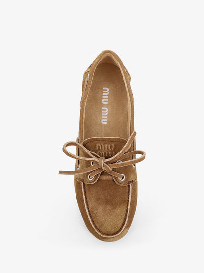 Mocassini in suede con logo ricamato thumbnail