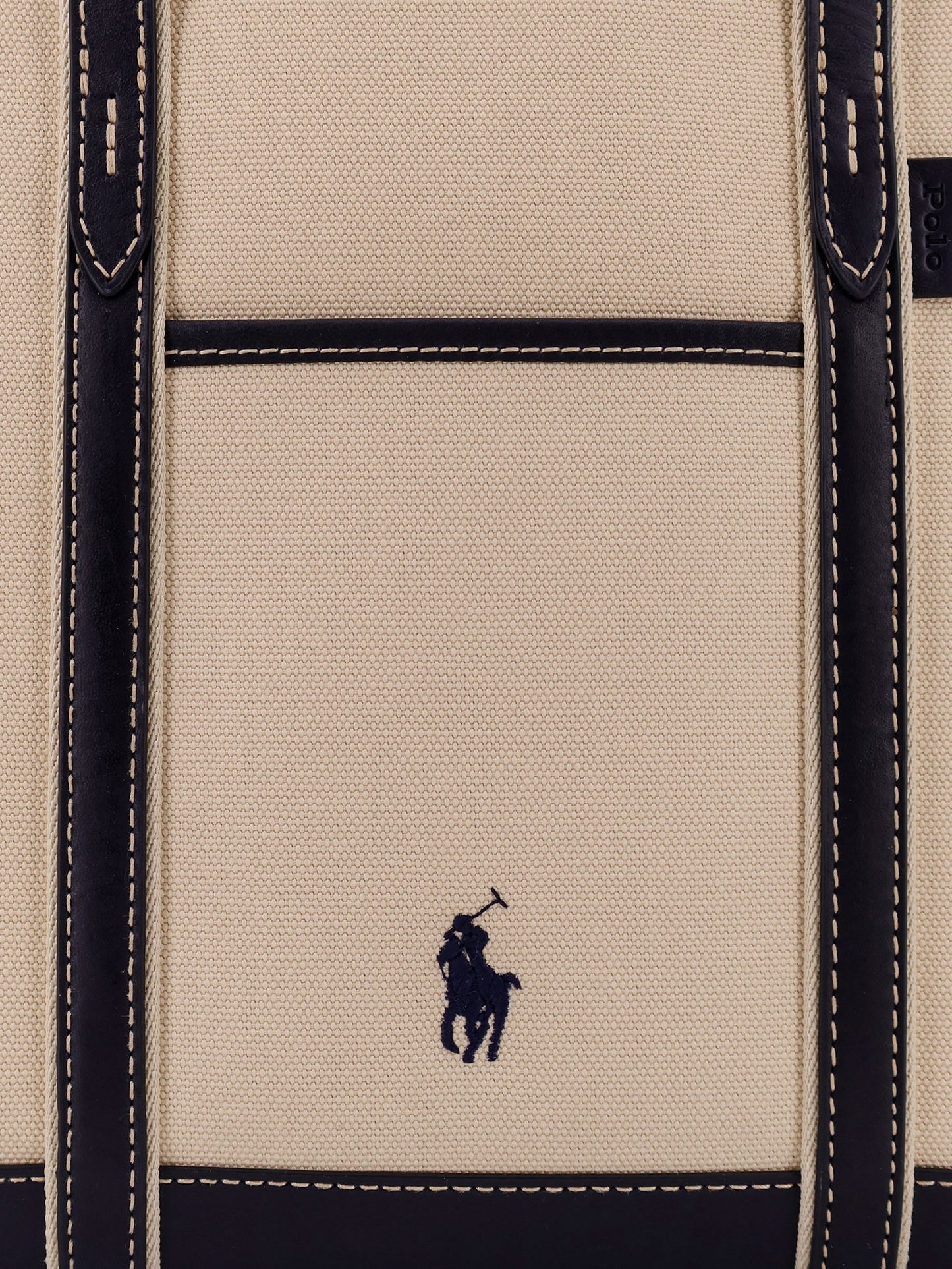 Canvas shoulder bag with embroidered logo on the front