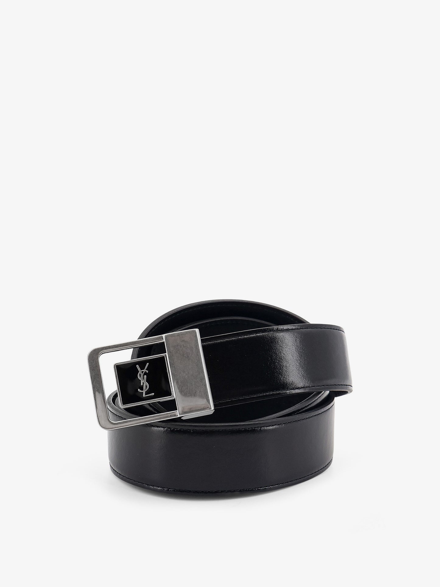 Leather belt with silver metal buckle