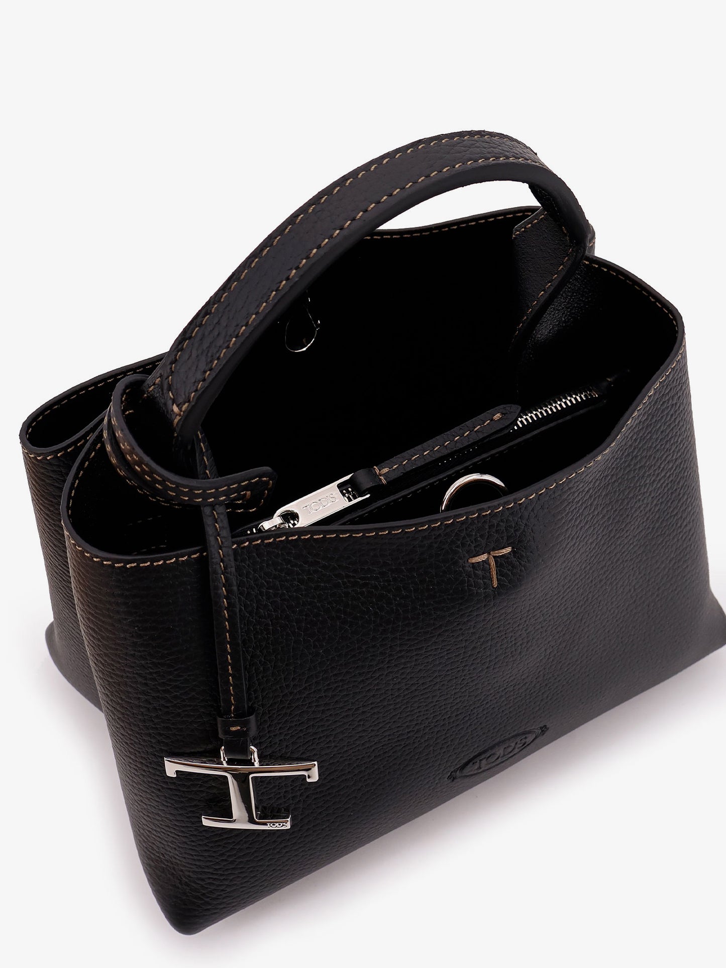 Micro leather crossbody bag with iconic stitching on the front