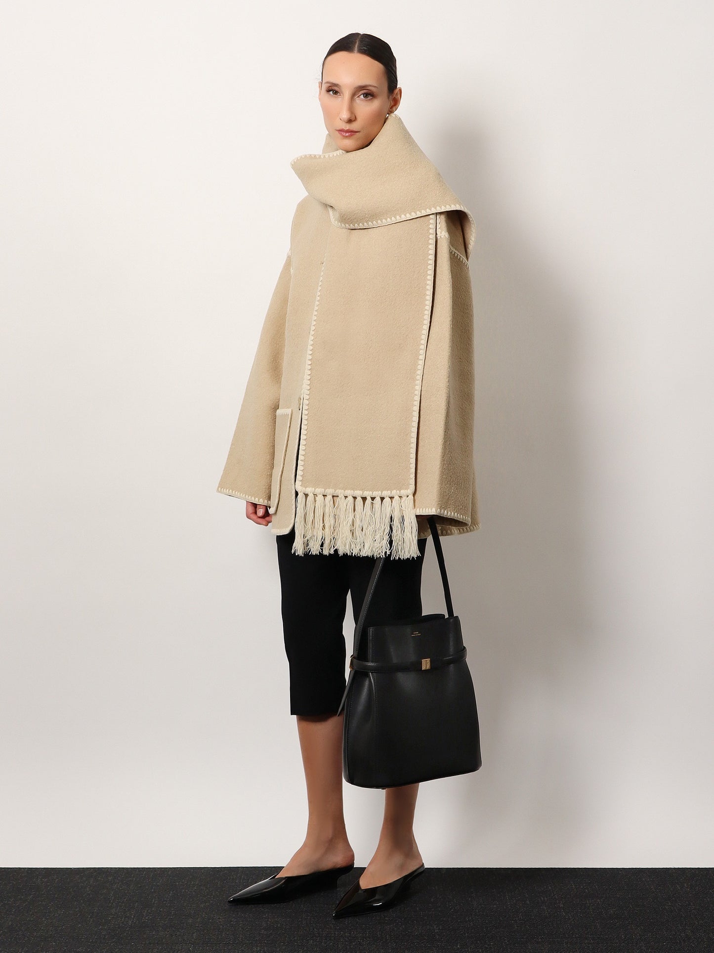 Belted leather bucket bag